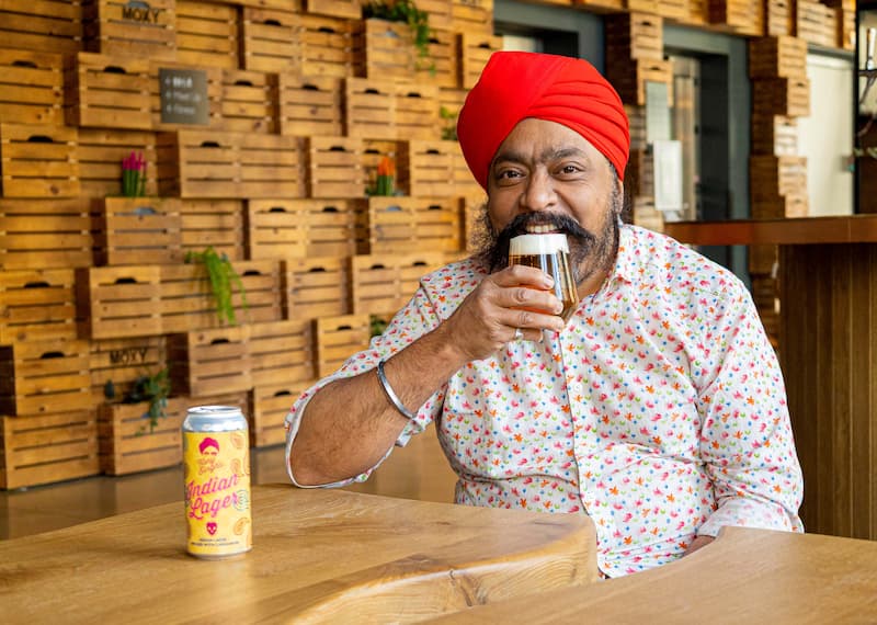 Tony Singh at Moxy Edin Fountainbridge sipping beer