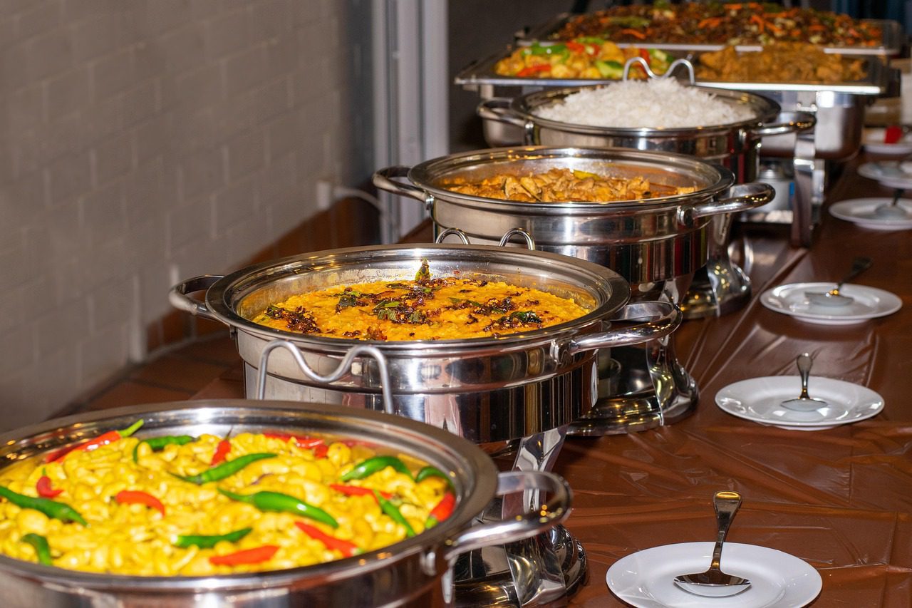 A buffet offers many curry choices to try