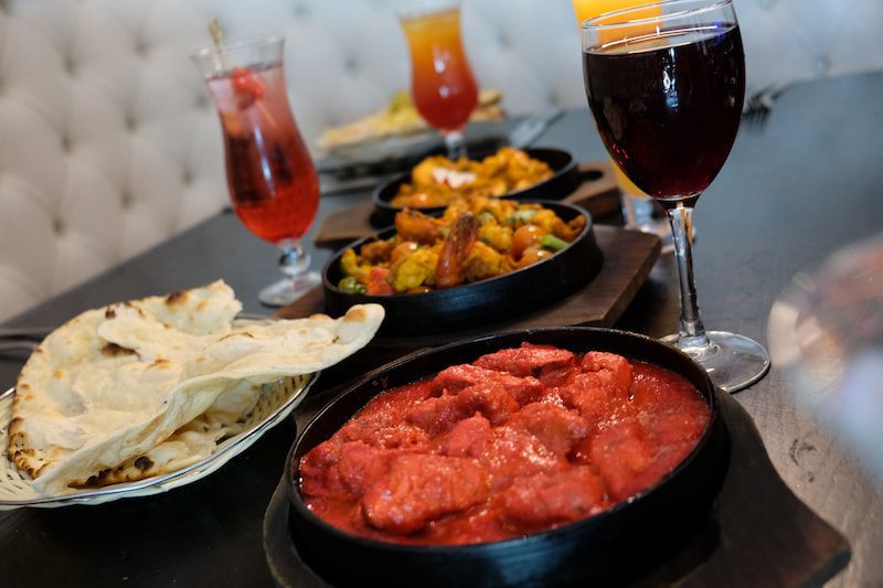 Tikka Massala'a red colouring comes from food colouring and is a mild dish based on butter chicken